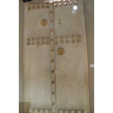 Tumulus door, cross with circles